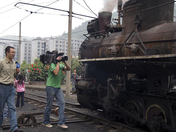 Reporters came too, for the steam-powered train has been selected as a cultural heritage.